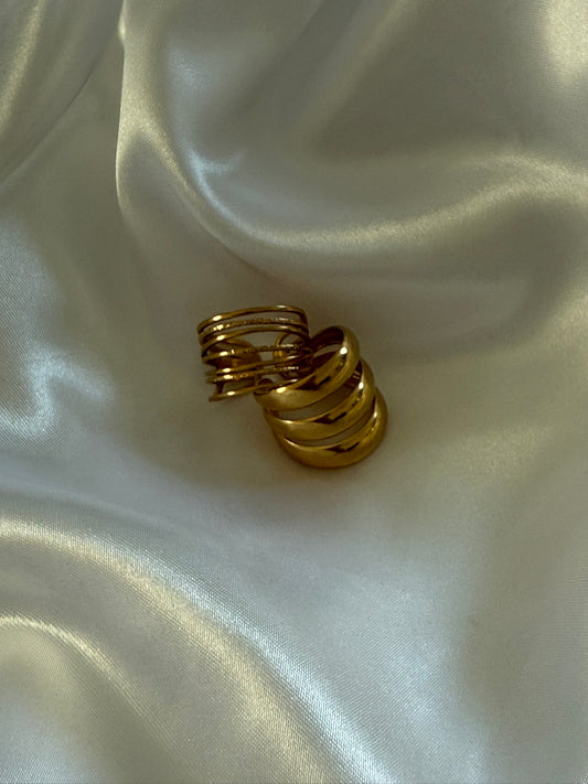 duo de bagues spira en acier inoxydable doré sur fond satiné, signé Onaïa bijoux