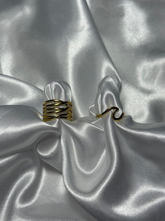 Duo de bagues Vela en acier inoxydable doré sur fond blanc satiné - Onaïa bijoux